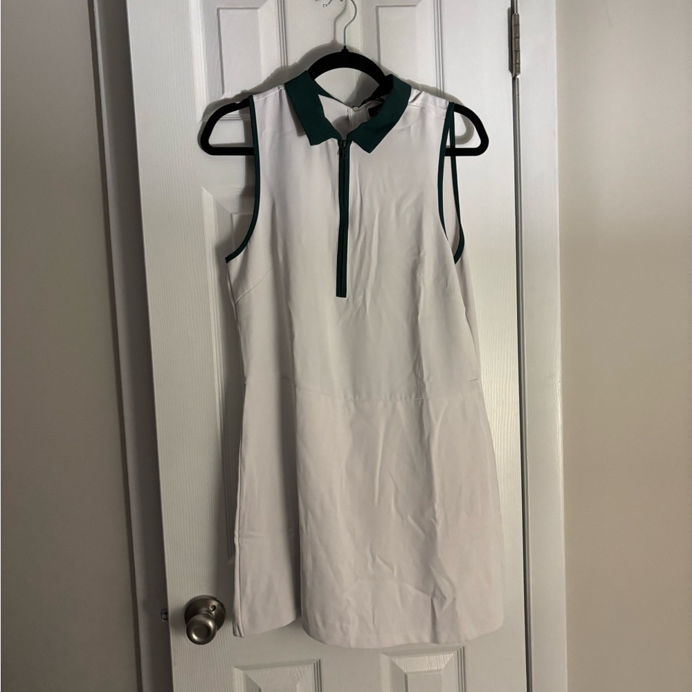 QY and green tennis dress